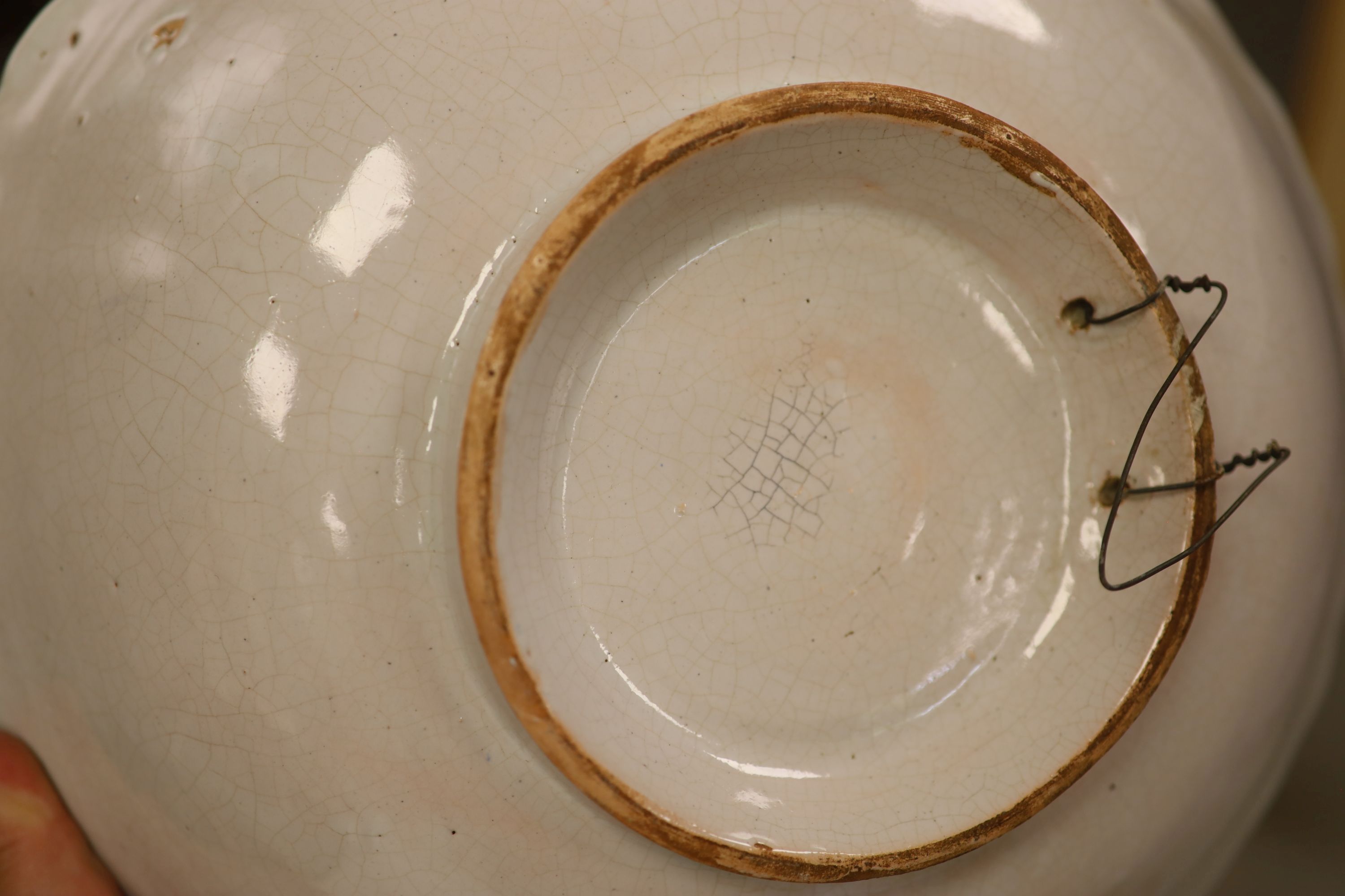 A large Quimper style faience bowl, diameter 32cm